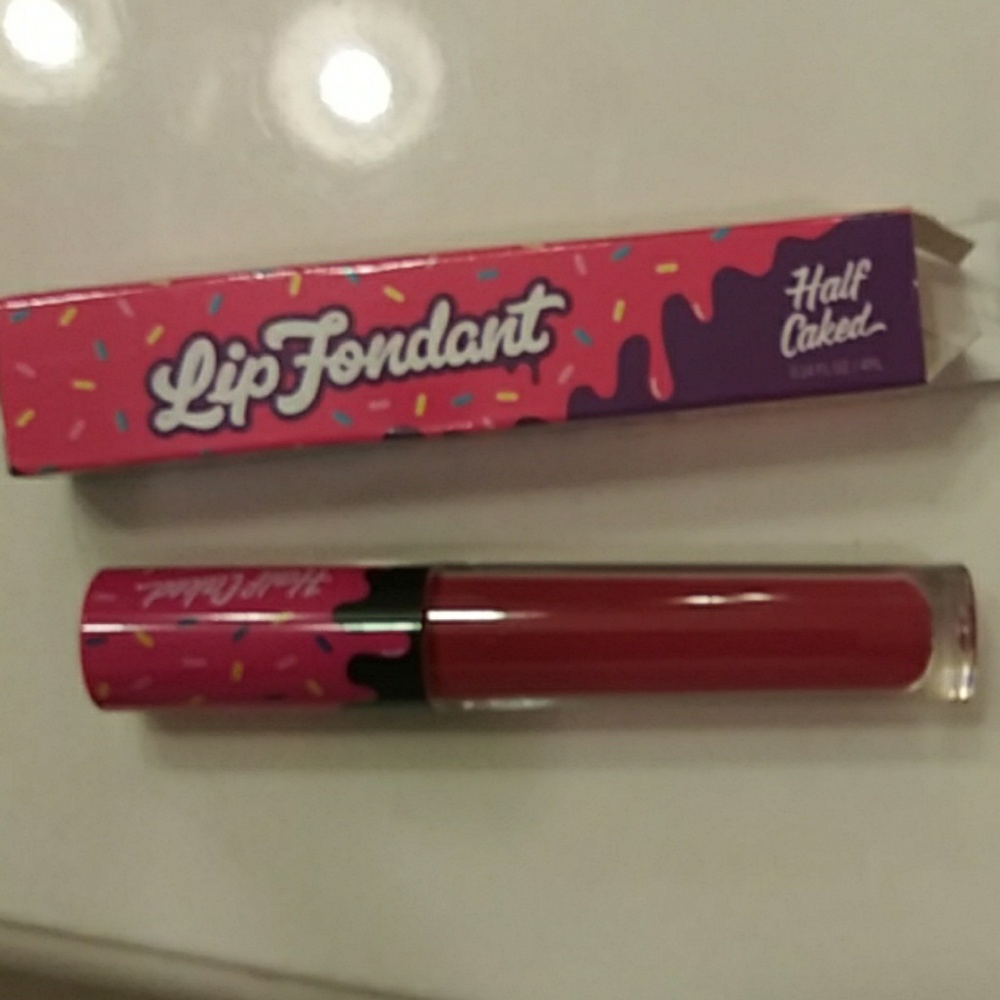 Half Caked Lip Gloss. NWT